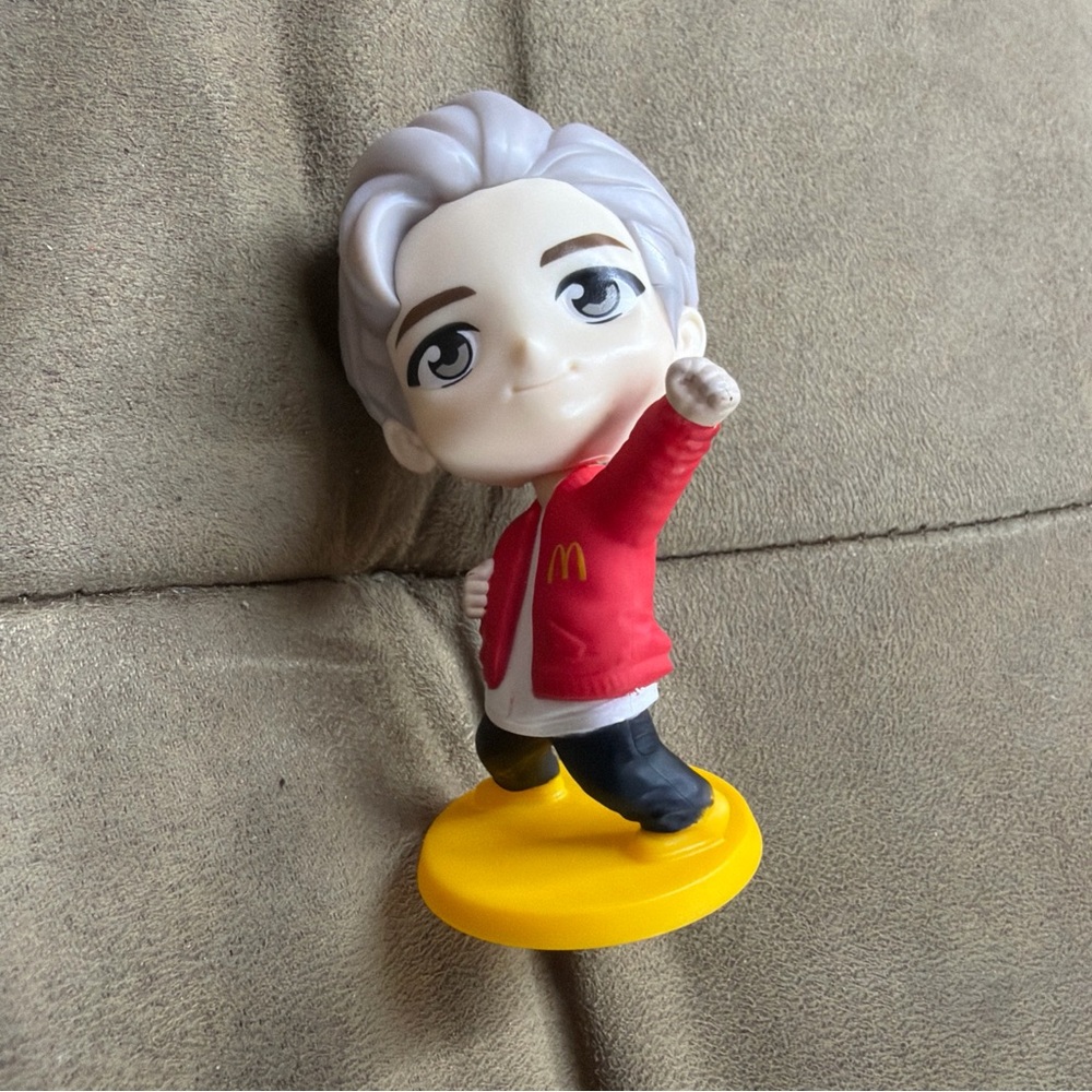 McDonald's Toy Figure with Red Jacket and Yellow Base